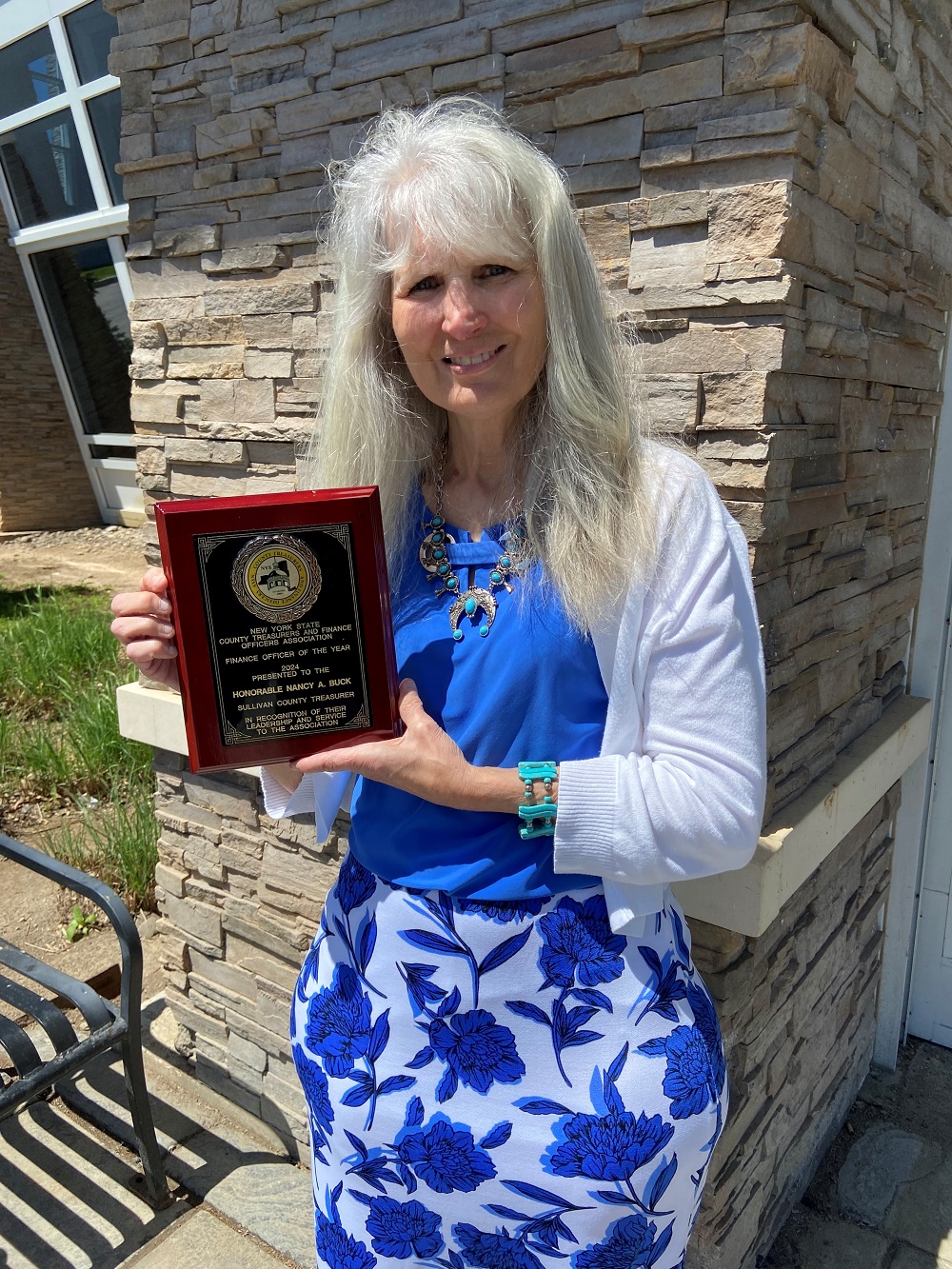 Nancy Buck and her award