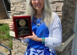 Nancy Buck and her award